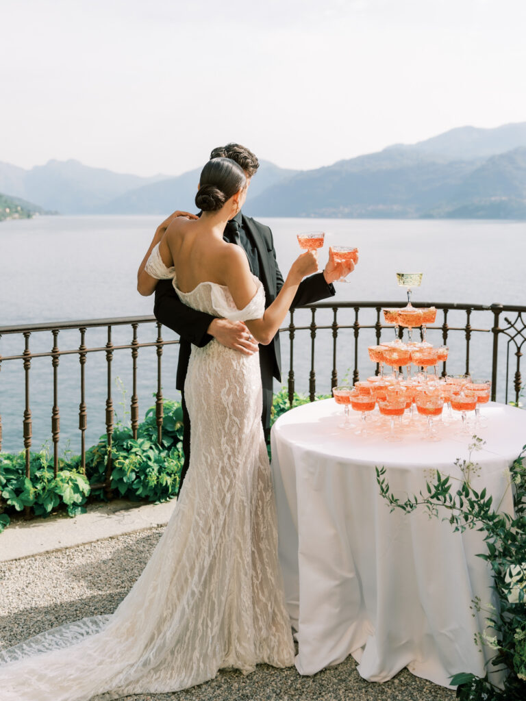 Bride and grom toast in italy, Aperol Spritz Champagne tower