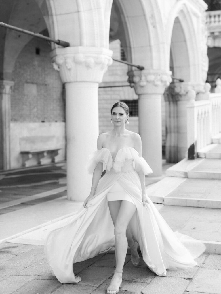 A woman walking on The Bridge of Sighs